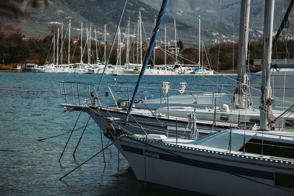 Porto Montenegro marina with mountains behind at sunset